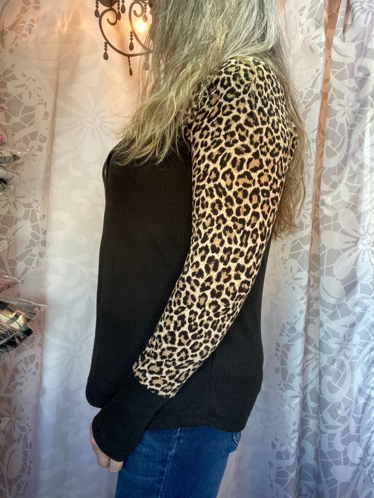 BLACK SWEATER WITH LEOPARD SLEEVES